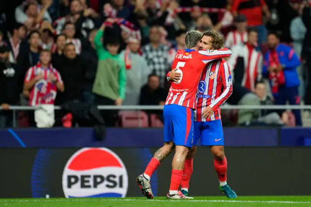 Griezmann celebrates his strike with a teammate