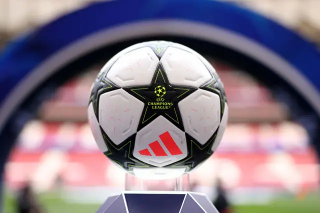 Champions League ball stands on a plinth on the touchline