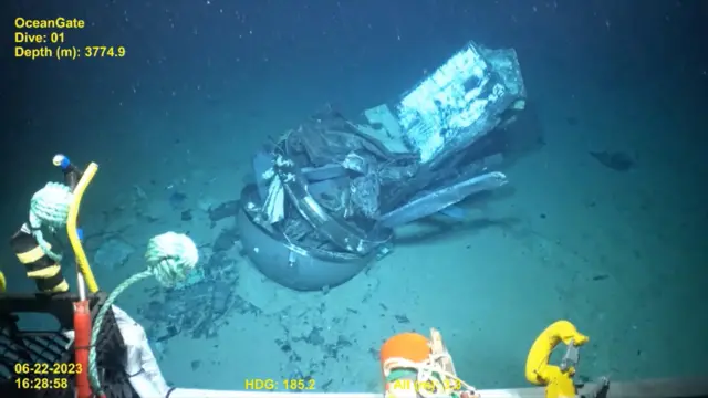 Footage from a remotely operated vehicle shows, what the Coast Guard Marine Board of Investigation says is the debris of the Titan submersible that imploded while diving to the wreck of the Titanic, on the seafloor, September 18, 2024, in this screengrab from a handout video.