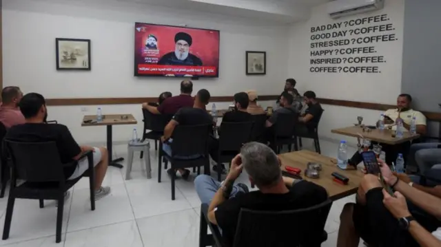 People watching a Nasrallah speech last month in a cafe in Tyre, southern Lebanon