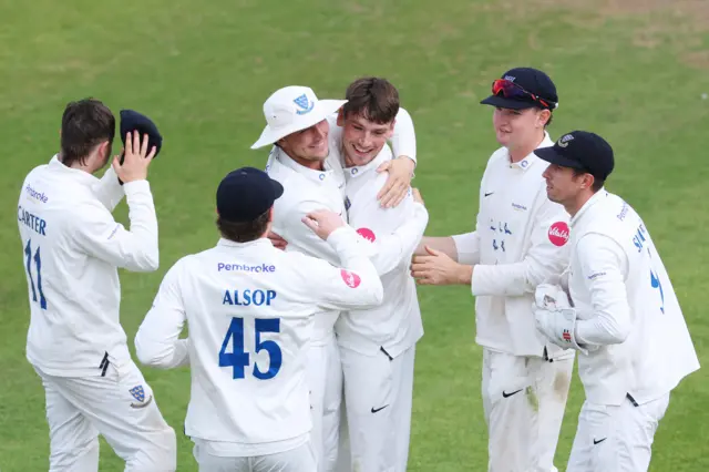 Henry Crocombe takes the final wicket