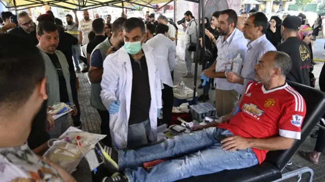 A man donating blood in Beirut yesterday