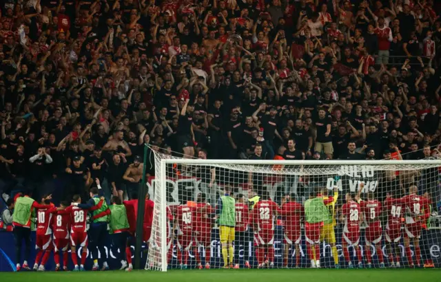 Brest players eagerly celebrate with their fans