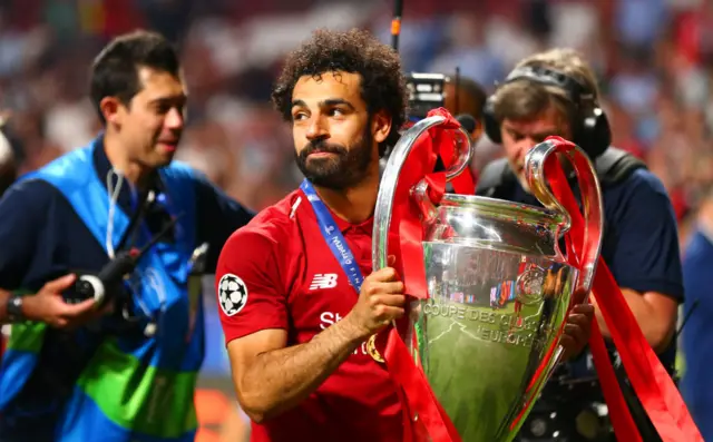 Mohamed Salah with the Champions League trophy