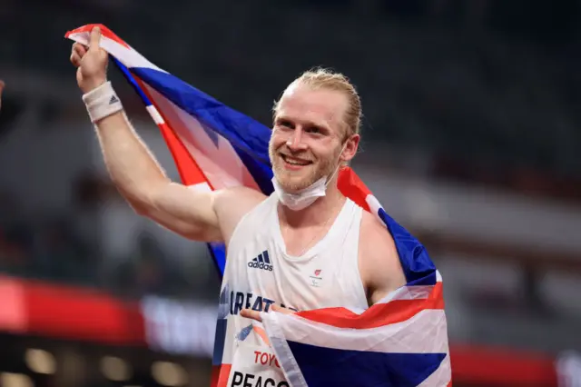 Jonnie Peacock with Great Britain flag