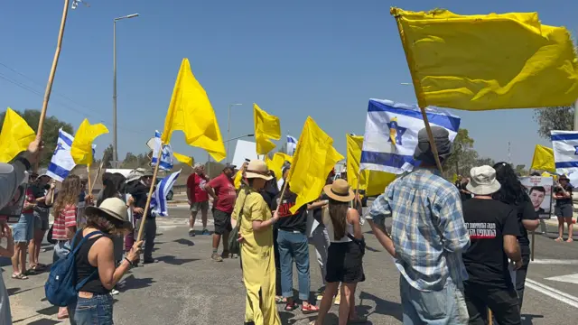 Protesters with flags