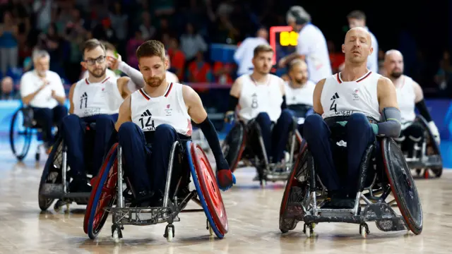 Great Britain players react after their defeat