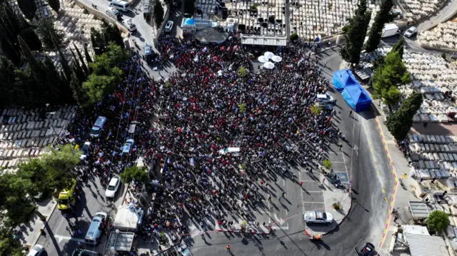 Drone footage shows the huge crowd gathered in Jerusalem to pay their respects to Hersh Goldberg-Polin