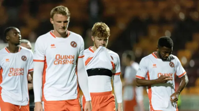 MOTHERWELL, SCOTLAND - SEPTEMBER 20: Dundee United's Luca Stephenson looks dejected at full time during a Premier Sports Cup quarter-final match between Motherwell and Dundee United at Fir Park, on September 20, 2024, in Motherwell, Scotland. (Photo by Craig Foy / SNS Group)