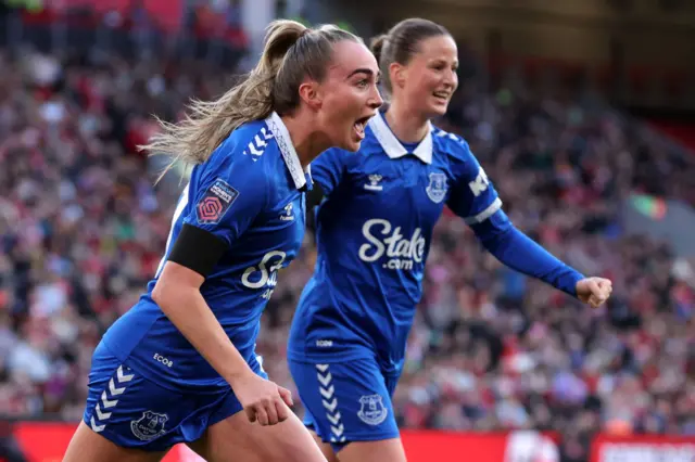 Finnigan celebrates her goal in the Merseyside derby at Anfield