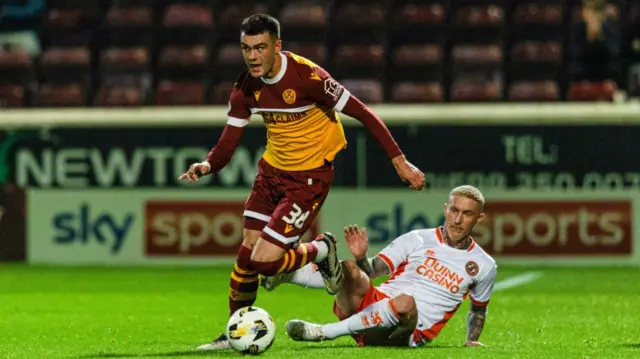 MOTHERWELL, SCOTLAND - SEPTEMBER 20: Motherwell's Craig Sibbald and Dundee United's Craig Sibbald in action during a Premier Sports Cup quarter-final match between Motherwell and Dundee United at Fir Park, on September 20, 2024, in Motherwell, Scotland. (Photo by Craig Foy / SNS Group)