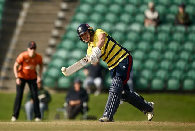 Alice Davidson-Richards plays a leg side shot during her 90 not out in the semi-final