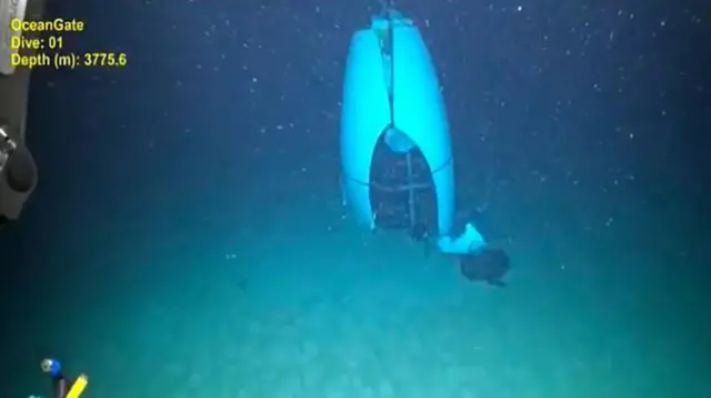 Footage from a remotely operated vehicle shows, what the Coast Guard Marine Board of Investigation says is the debris of the Titan submersible that imploded while diving to the wreck of the Titanic, on the seafloor, September 18, 2024, in this screengrab from a handout video.