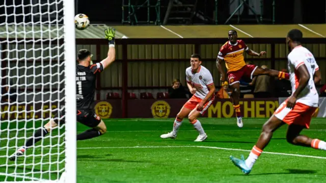 MOTHERWELL, SCOTLAND - SEPTEMBER 20: Motherwell's Zach Robinson scores to make it 1-0 during a Premier Sports Cup quarter-final match between Motherwell and Dundee United at Fir Park, on September 20, 2024, in Motherwell, Scotland. (Photo by Rob Casey / SNS Group)