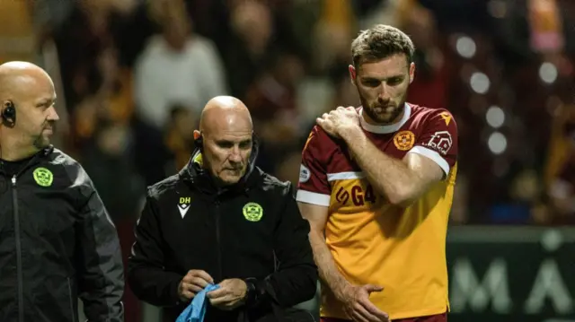 MOTHERWELL, SCOTLAND - SEPTEMBER 20: Motherwell's Stephen O'Donnell goes off injured whilst holding his shoulder during a Premier Sports Cup quarter-final match between Motherwell and Dundee United at Fir Park, on September 20, 2024, in Motherwell, Scotland. (Photo by Craig Foy / SNS Group)