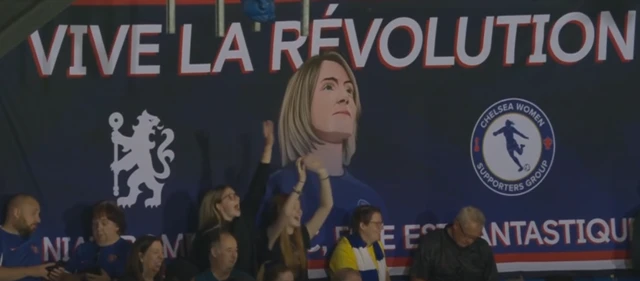 Vive La Revolution flag of Sonia Bompastor in the stands