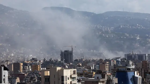 Smoke rises from suburbs in southern Beirut following Israeli air strike