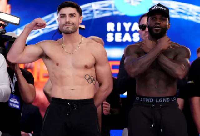 Josh Kelly and Ishmael Davis weigh in and pose for pictures