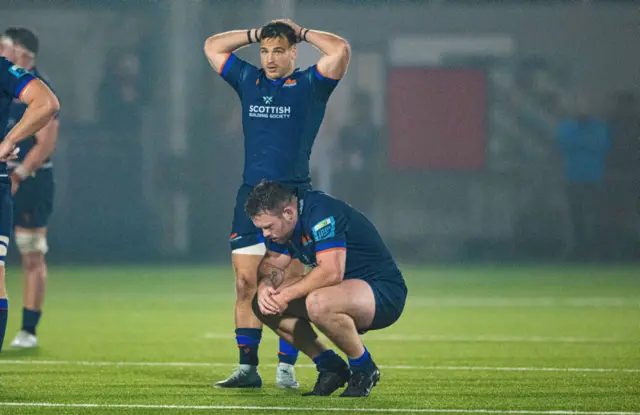 Wes Goosen and Ewan Ashman look dejected at full-time