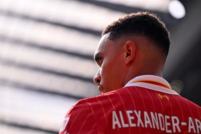 Trent Alexander-Arnold of Liverpool looks on