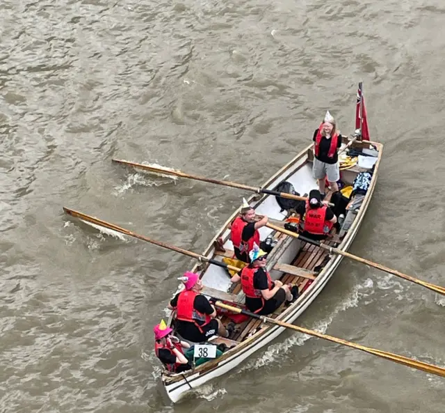 An overhead shot of the Sea Scouts in their boat