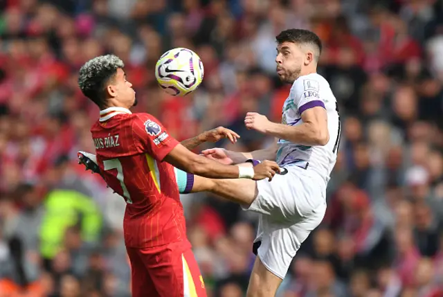 Liverpool's Luis Díaz battles with Bournemouth's Ryan Christie