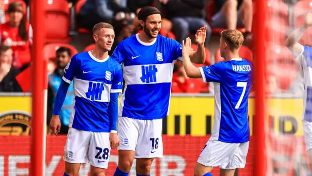 Birmingham players celebrate with Jay Stansfield after his goal against Rotherham.