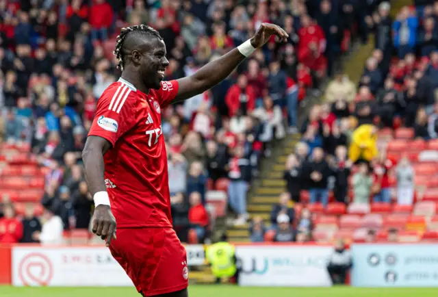 Aberdeen's Pape Habib Gueye celebrates scoring to make it 1-0 during a Premier Sports Cup quarter-final match between Aberdeen and The Spartans at Pittodrie