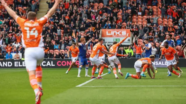 James Husband celebrates scoring for Blackpool last weekend against Exeter.