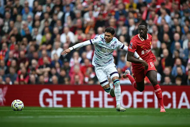 Evanilson challenges Liverpool's French defender #05 Ibrahima Konate