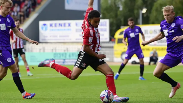 Kami Doyle scores for Exeter against Stevenage.