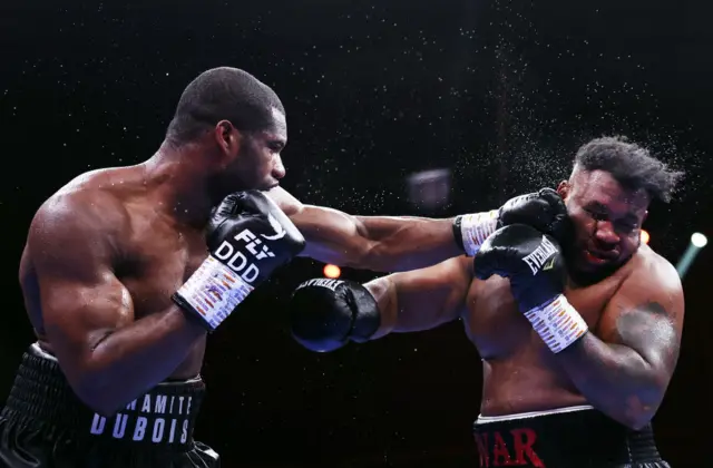 Daniel Dubois lands a punch on the face of Jarrell Miller