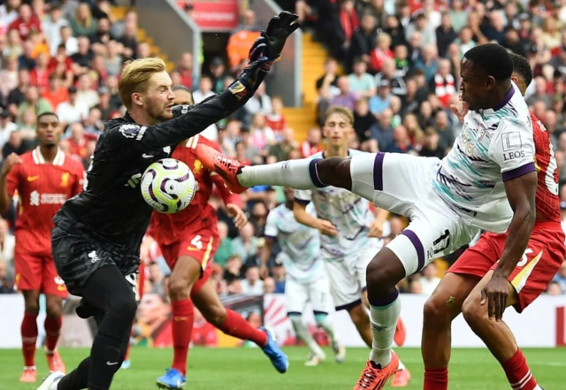 Caoimhin Kelleher in action with AFC Bournemouth's Luis Sinisterra