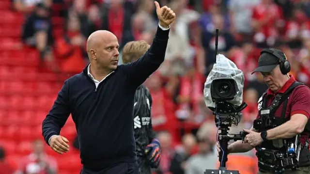 Arne Slot Head Coach of Liverpool showing his appreciation