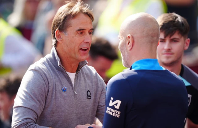 West Ham United manager Julen Lopetegui (left) embraces Chelsea manager Enzo Maresca