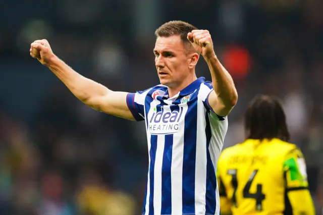 Jed Wallace celebrates