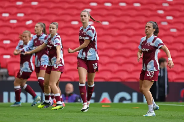 West Ham players conduct a drill in the warm up