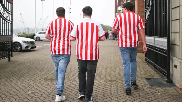 Sunderland fans arrive at the Stadium of Light