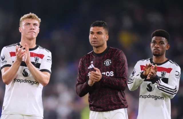 Manchester United's Rasmus Hojlund (left), Manchester United's Casemiro and Manchester United's Amad Diallo