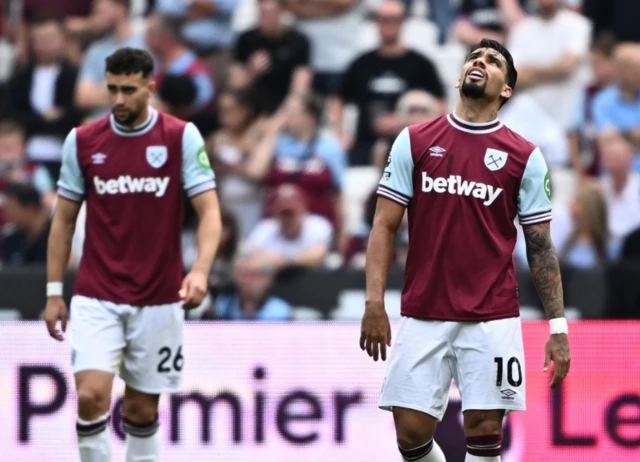 West Ham United's Lucas Paqueta reacts after Chelsea's Cole Palmer scored