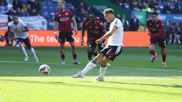 Dion Charles converts his penalty for Bolton Wanderers.