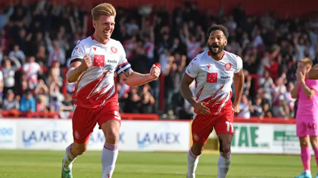 Stevenage's Carl Piergianni celebrates scoring against Barnsley.