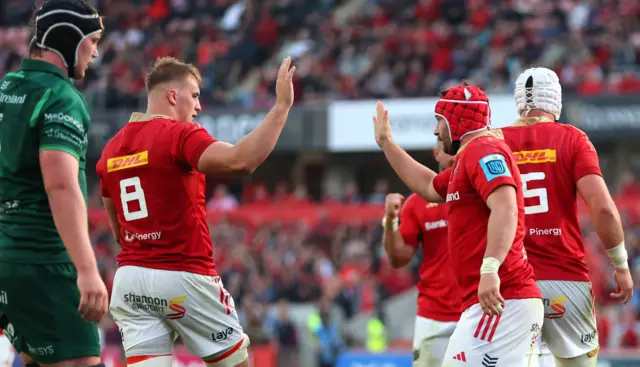 John Hodnett celebrates his try