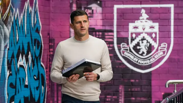 Portsmouth head coach John Mousinho at Turf Moor