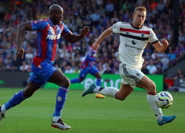 Crystal Palace's Jean-Philippe Mateta in action with Manchester United's Matthijs de Ligt