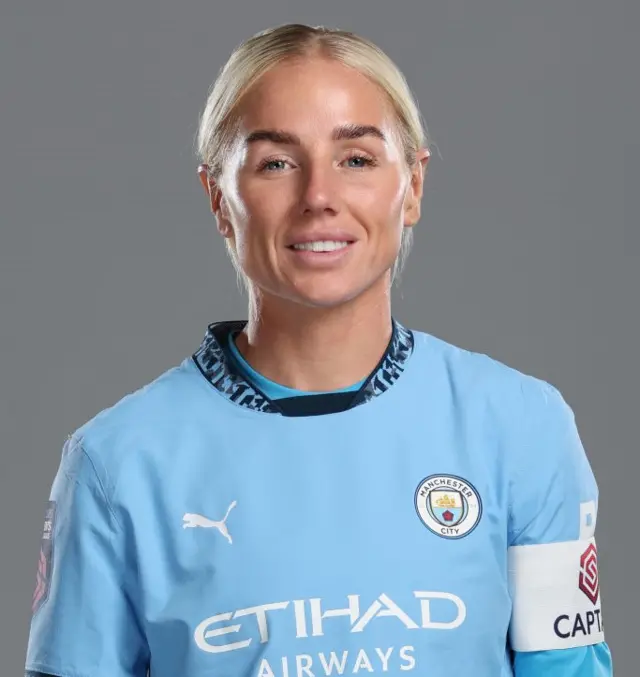 Alex Greenwood poses with the City captain's armband