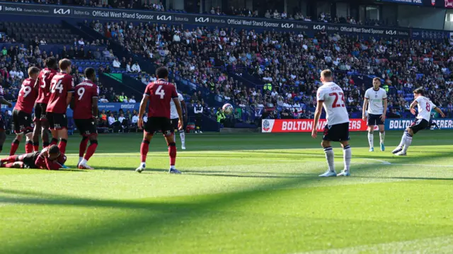 Josh Sheehan fires Bolton into the lead from a free-kick.