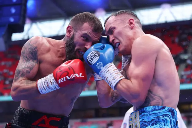 Anthony Cacace and Josh Warrington come together with punches