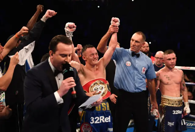 Josh Warrington celebrates as Carl Frampton is announced the loser