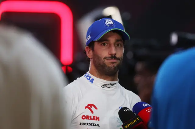 Daniel Ricciardo being interviewed in the media pen